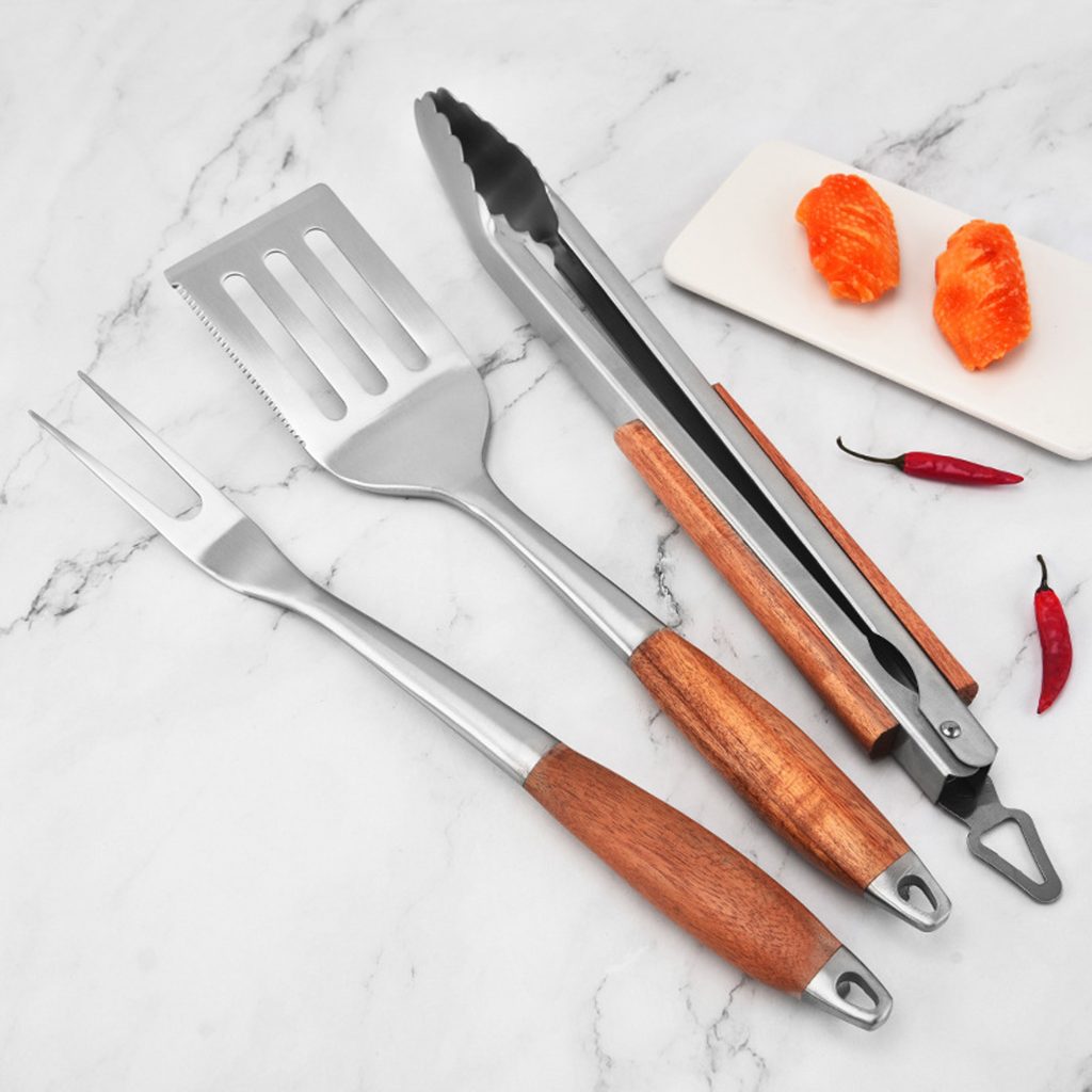 BBQ Tool Set – 4-Piece Stainless with Wood Handles in use